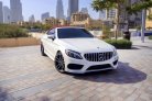 White Mercedes Benz C300 Convertible 2019 for rent in Dubai 1